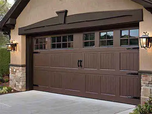 Faux wood carriage house steel garage door with windows installed on Scottsdale Arizona home