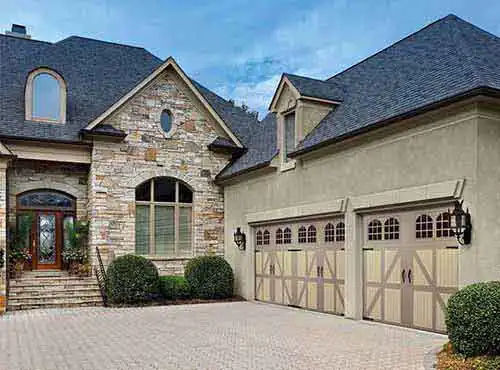 Carriage style garage door installation in maricopa county az safari garage door and gate safari garage door and gate Carriage house style garage door with windows installed on home in Maricopa County Arizona
