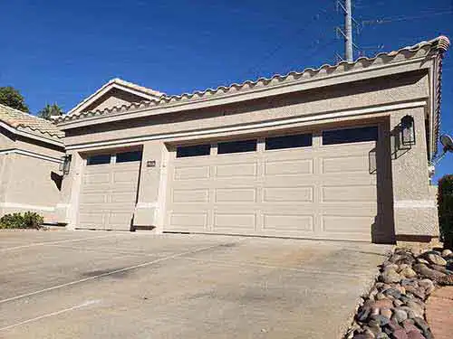 Standard residential garage door installation in maricopa county safari garage door and gate safari garage door and gate Classic raised panel insulated steel garage door installed on a residential home in Maricopa County Arizona