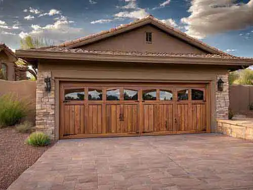 Hardwood custom garage door installation in arizona safari garage door and gate safari garage door and gate Custom hardwood wood garage door installed on home in Maricopa County Arizona
