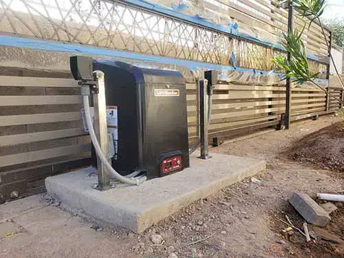 Automatic gate opener system installation in phoenix az safari garage door and gate safari garage door and gate Motorized automatic driveway gate opener installed at a residential property in Phoenix Arizona