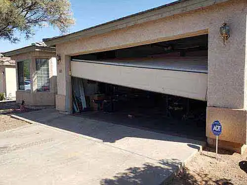 Residential garage door repair service on home in Arizona